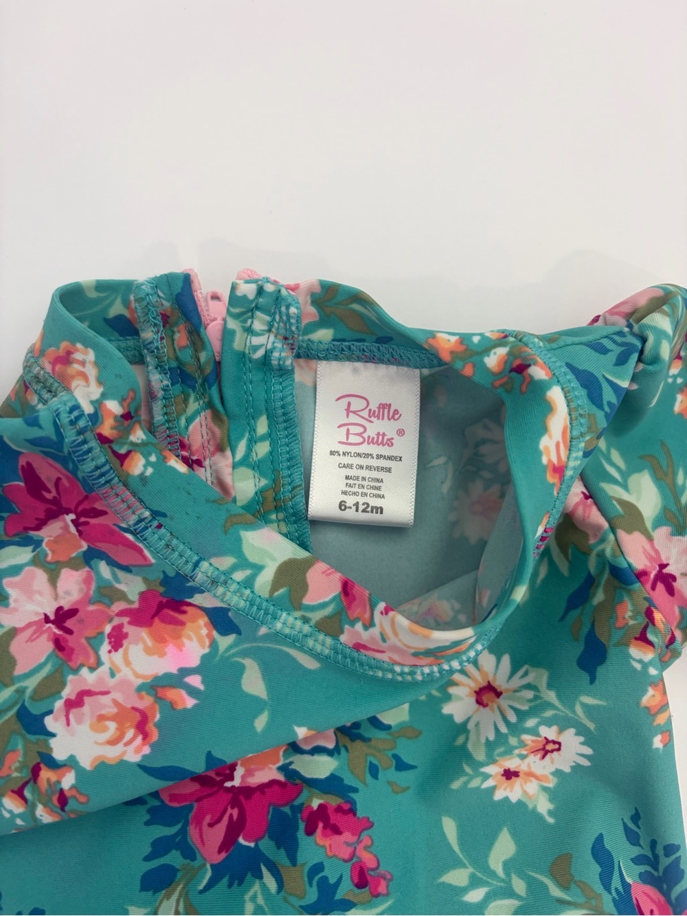 Ruffle Butts Blue Floral Long-Sleeve Baby Swimsuit - Picture 3 of 4